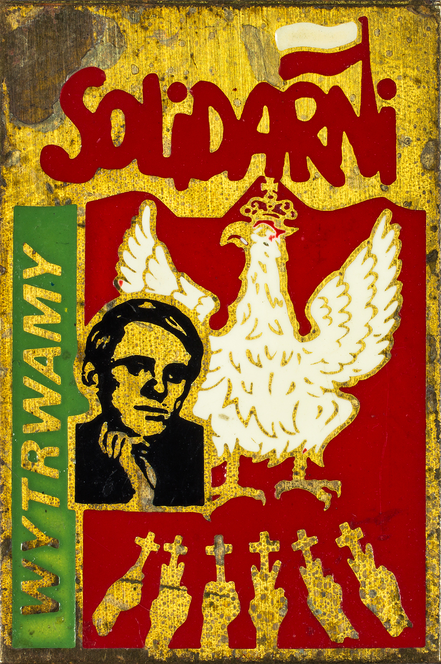 Zdjęcie 033. Przypinka o treści: SOLIDARNI WYTRWAMY.